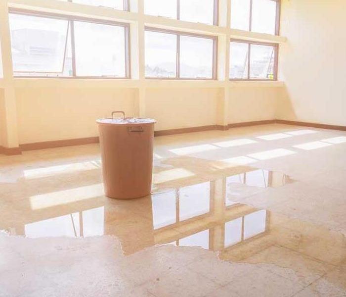 water damage on a floor in a classroom